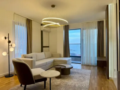 Modern and bright living room with a sectional sofa and access to the terrace. - image 10