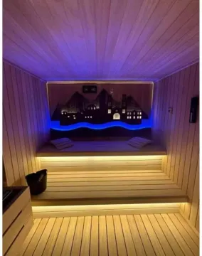 Wooden sauna with lighting and seating benches. - image 4