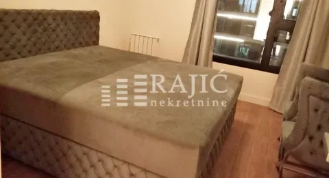Furnished bedroom with a double bed. - image 13