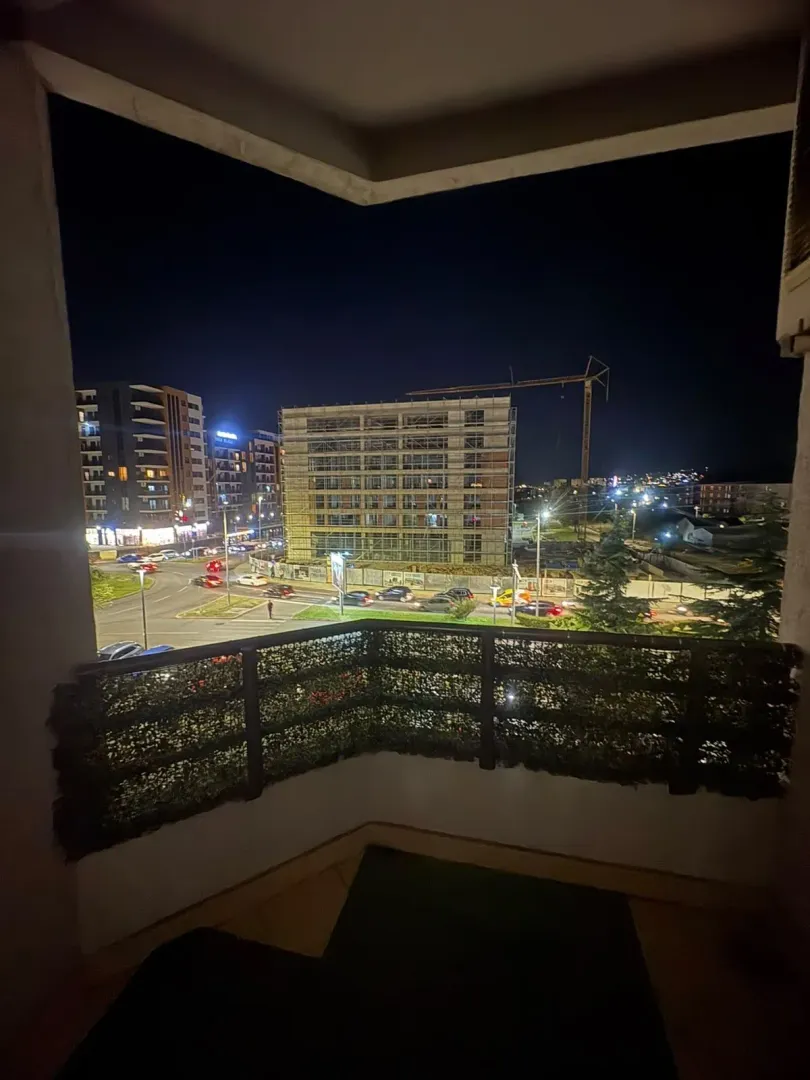 View of the city from the terrace at night.