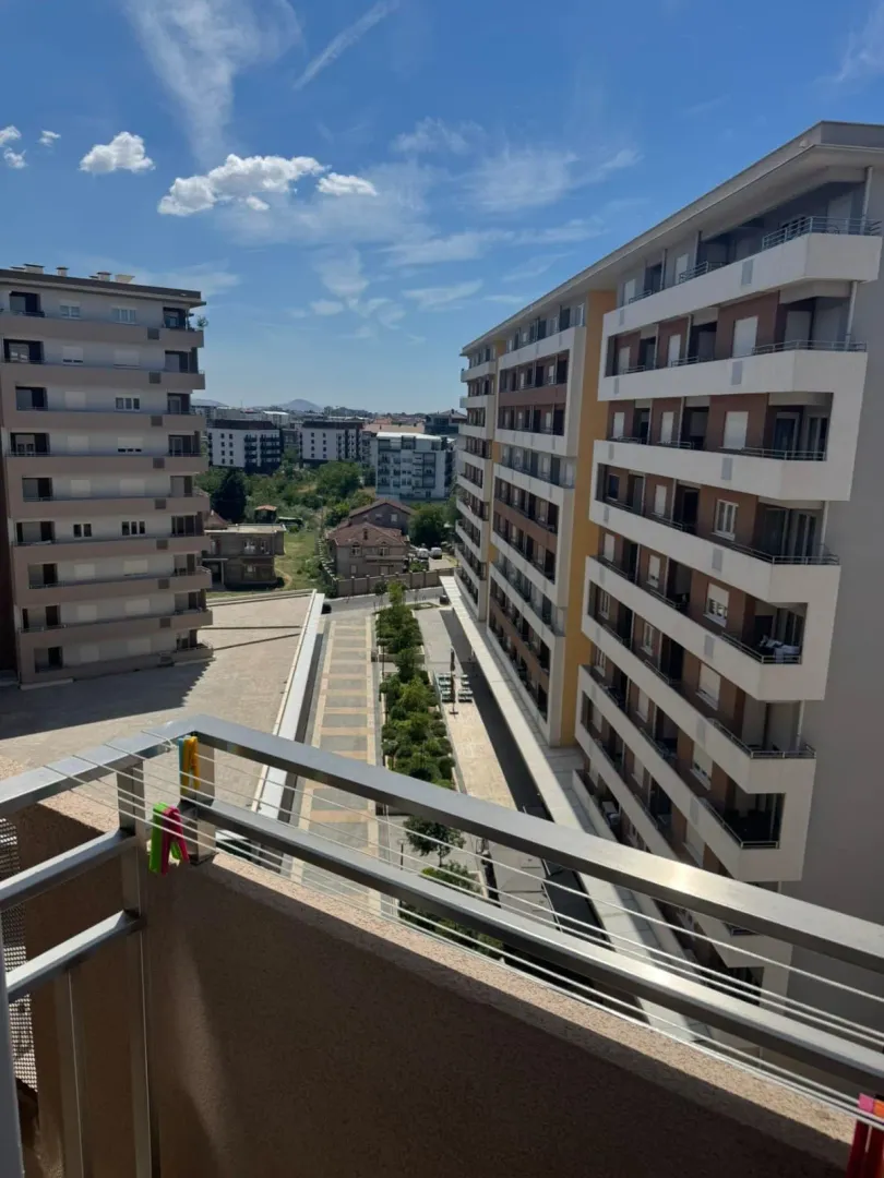 View of surrounding buildings and neighborhood from the balcony.