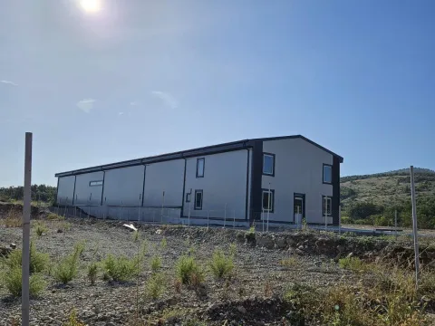 Exterior of a new industrial or warehouse building. - image 14