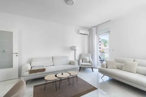 Bright and modernly furnished living room with a sofa set and balcony access. - image 5