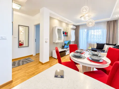Dnevni boravak sa trpezarijom i modernim nameštajem. - image 4