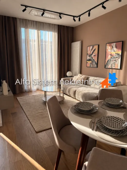 Living room with a dining area and seating set.
