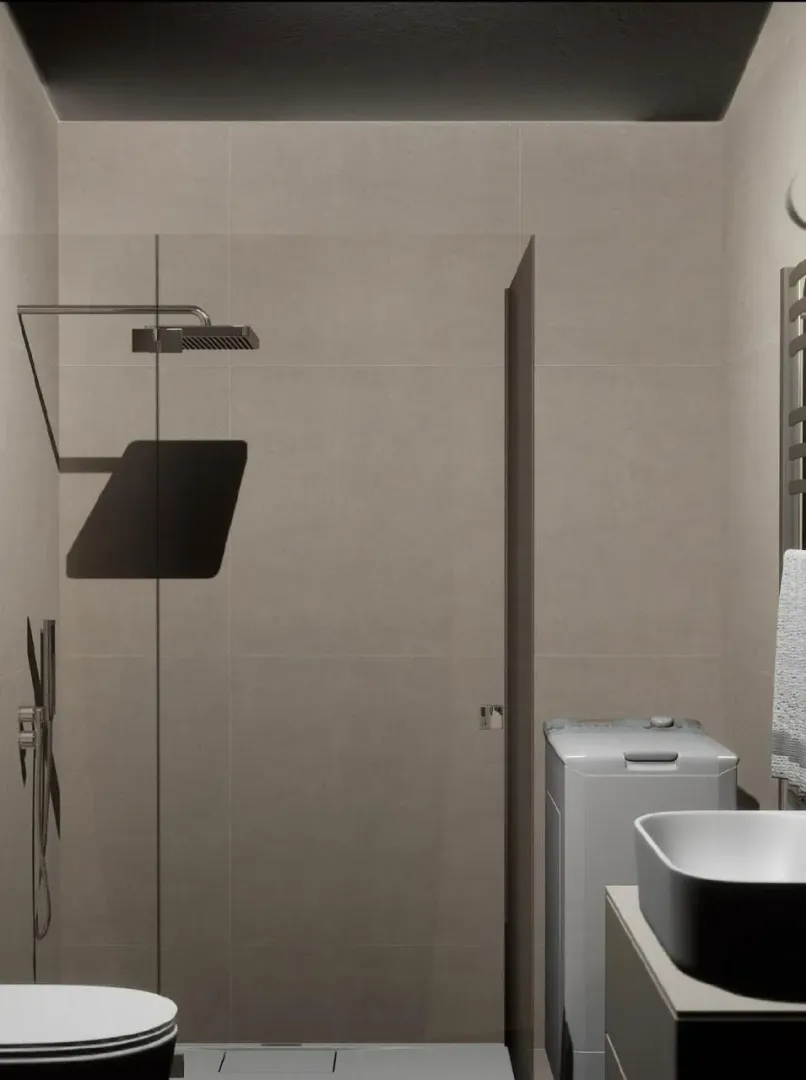 Modernly equipped bathroom with a walk-in shower, washbasin, and washing machine.
