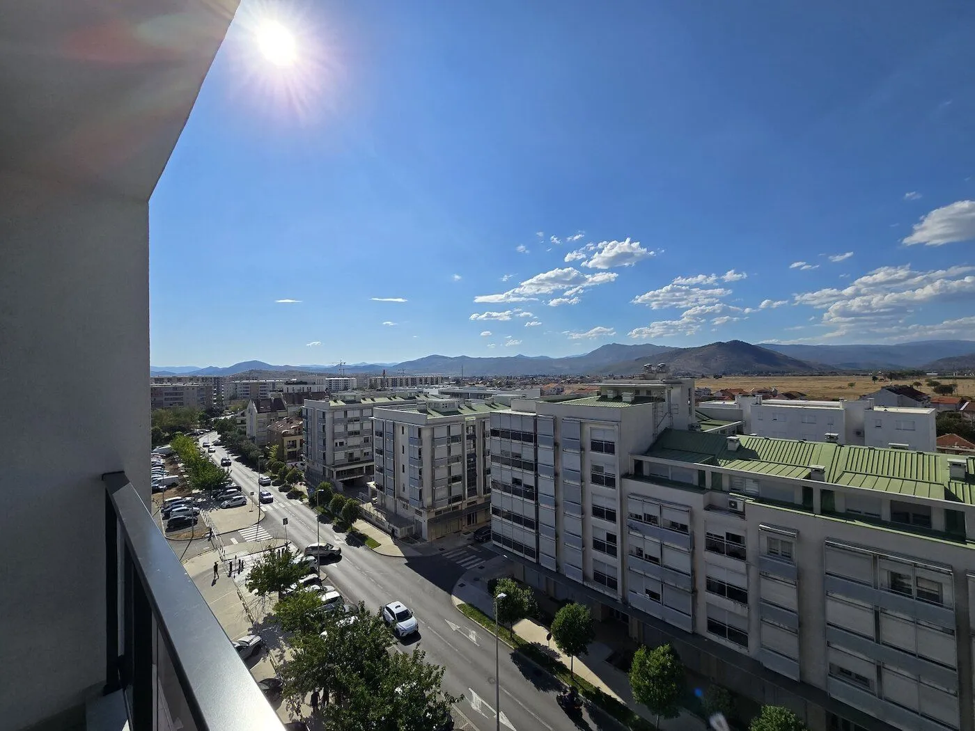 View of the city and surrounding mountains from the terrace.