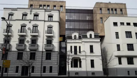 Exterior view of a modern and historical building. - image 2