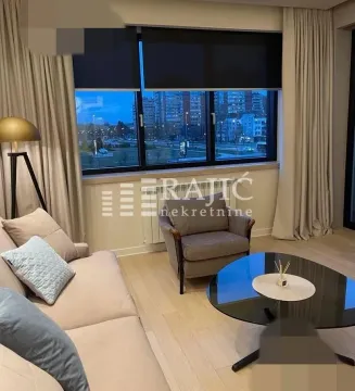 Modern living room with a sofa and armchair. - image 8