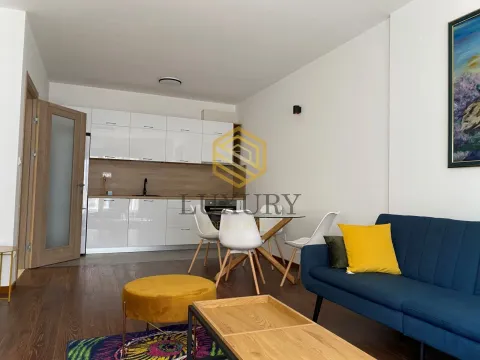 Living room with dining area and kitchen. - image 3