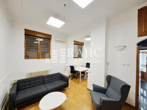Living room with sofa and table. - image 8