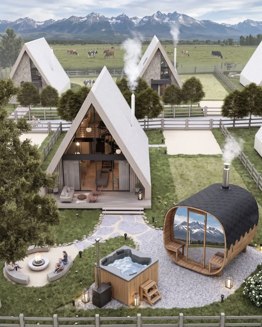 Aerial view of a complex of modern A-frame houses with a yard, hot tub, and sauna.