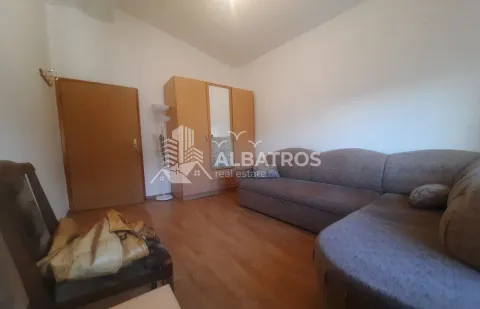 Living room with a sofa set and a wardrobe. - image 8