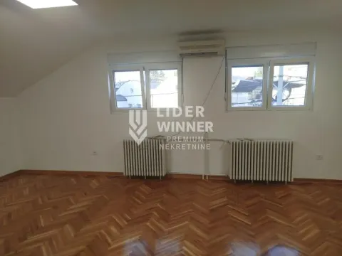 Empty room with parquet flooring and white walls. - image 13