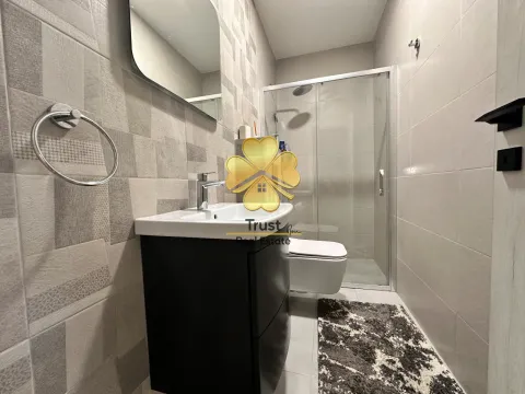 Modernly equipped bathroom with a shower cabin. - image 14
