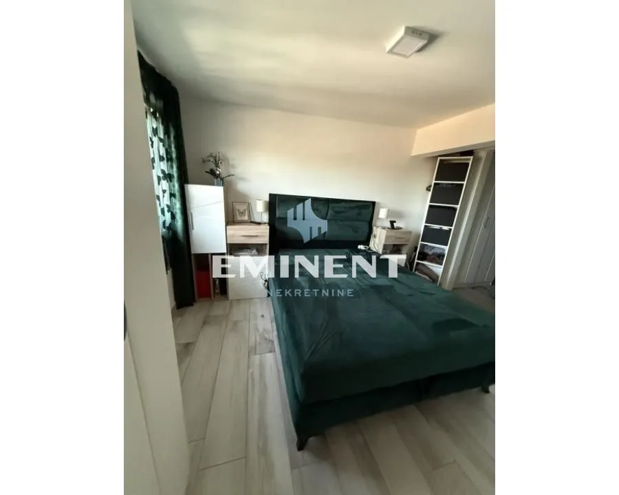 Bedroom with a double bed and bedside tables.