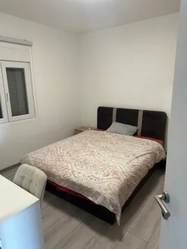 Bedroom with a double bed and a window. - image 5