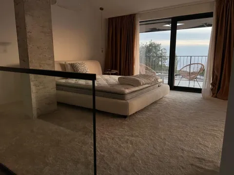Modern bedroom with a double bed and access to the terrace. - image 15