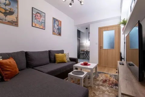 Bright living room with a corner sofa. - image 2