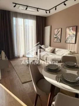 Living room with dining area and seating furniture. - image 3