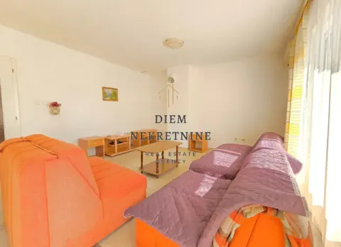 Living room with sofas and wooden furniture. - image 16