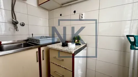 Small kitchen with a sink and counter elements. - image 7