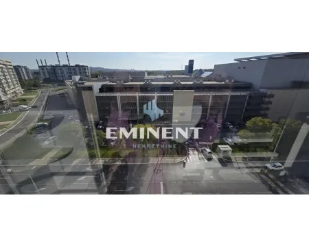 View through the window of surrounding buildings and the street. - image 22
