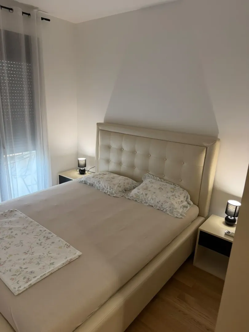 Bedroom with a double bed and bedside tables.