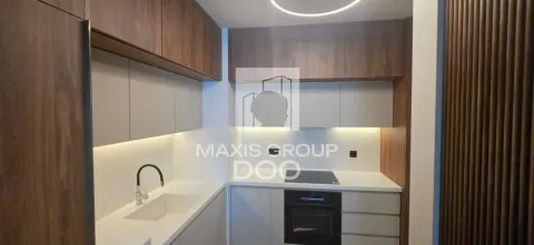 Modern kitchen with built-in cabinetry and lighting. - image 6