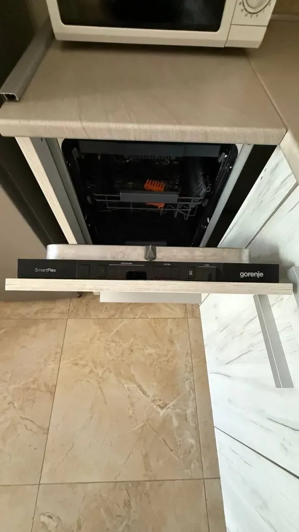 Top-down view of a built-in dishwasher in the kitchen.