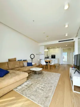 Spacious living room connected to the dining area and kitchen. - image 4