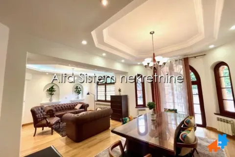 Spacious living room with a dining area and sofa set. - image 5