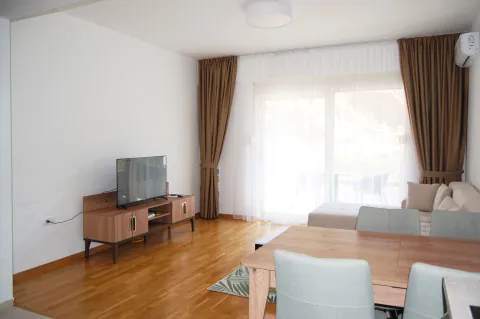 Living room with dining area and terrace access. - image 12