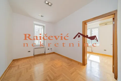 Empty room with parquet flooring and white walls. - image 10