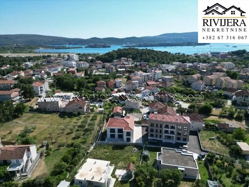 Aerial view of the settlement and surrounding area near the sea.
