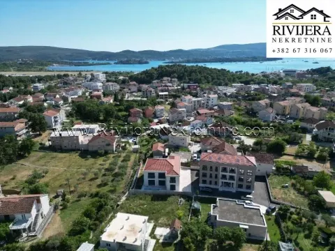 Aerial view of the settlement and surrounding area near the sea. - image 3