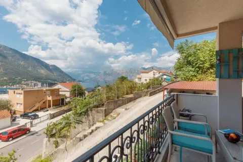 Furnished balcony with seating set and views of the sea and mountains. - image 7