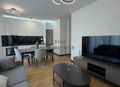 Modern living room with dining area and kitchen. - image 5