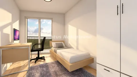 Small bedroom with a bed, desk, and wardrobe. - image 11