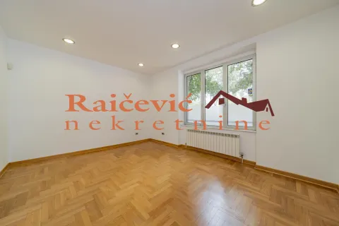 Empty room with parquet flooring and white walls. - image 5
