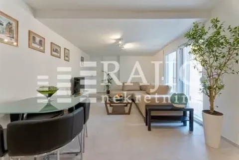 Spacious living room with a dining area and a sofa set. - image 10