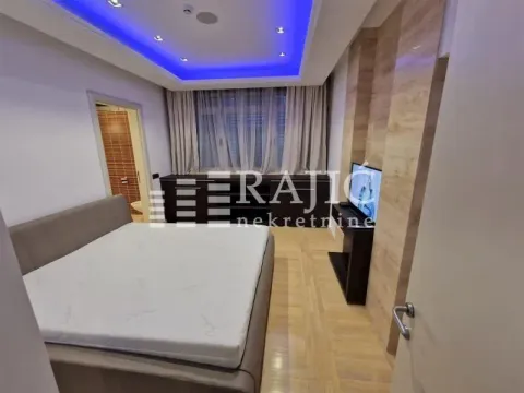 Furnished bedroom with a double bed. - image 5