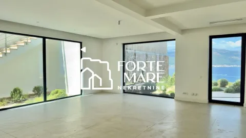 Empty living room with large glass surfaces and a sea view. - image 15