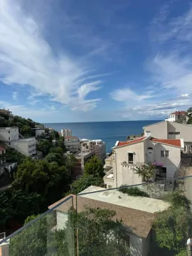 View of the sea and surrounding buildings from the terrace. - image 14