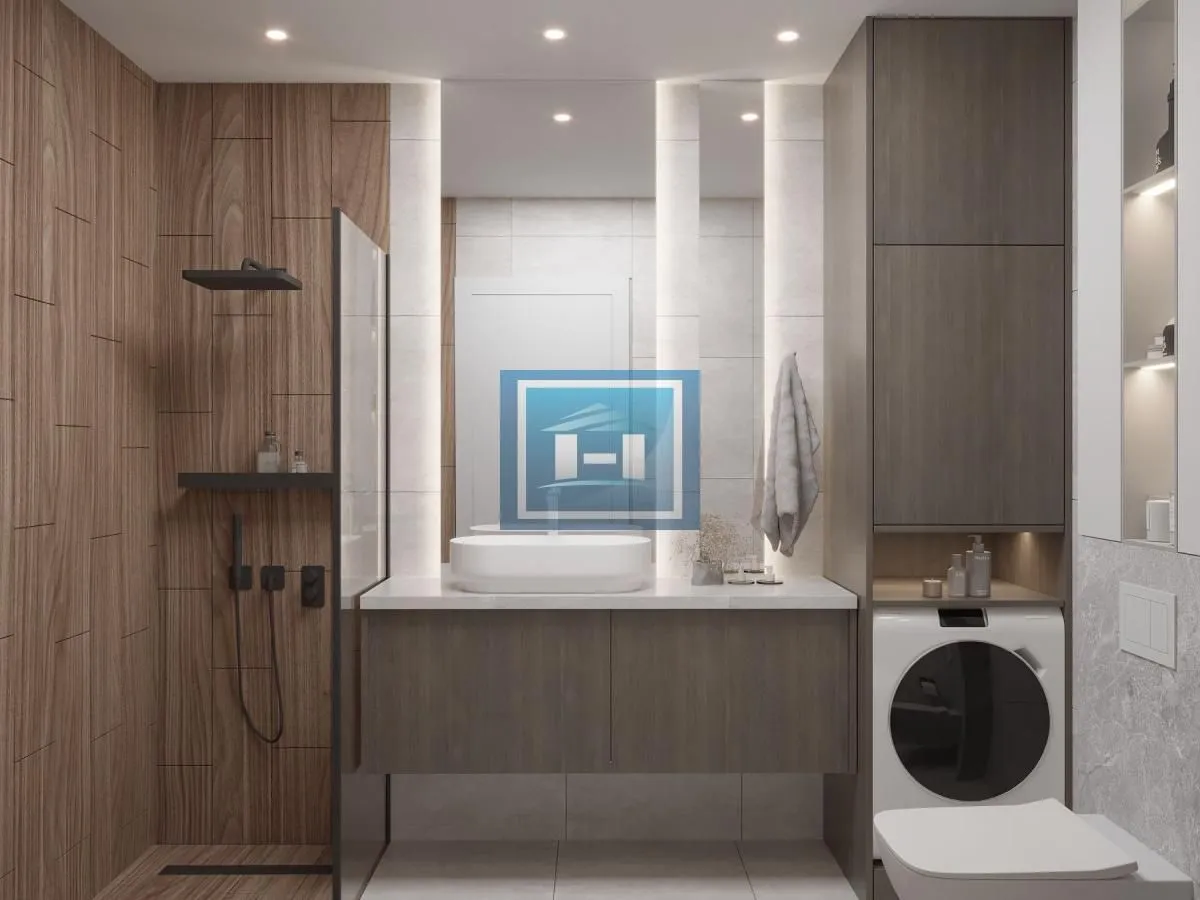 Modern bathroom with walk-in shower, washbasin, and washing machine.