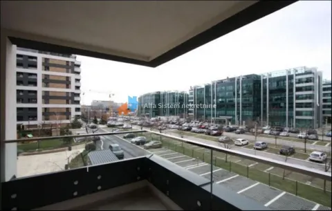 Pogled sa terase na okolne zgrade i parking. - image 17