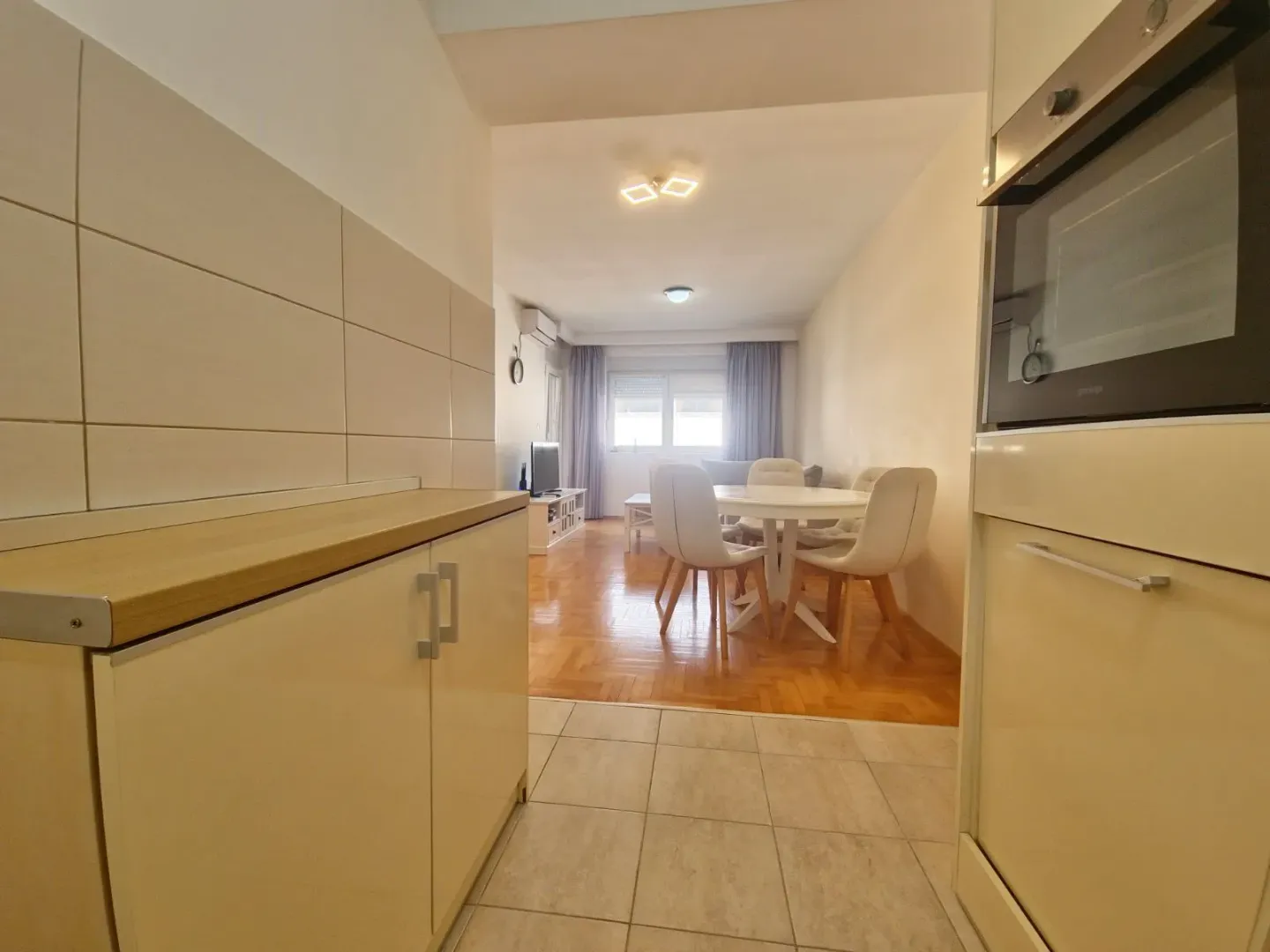 View from the kitchen towards the dining area and living room.