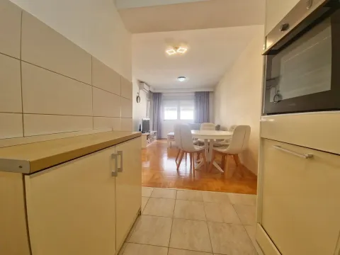 View from the kitchen towards the dining area and living room. - image 17