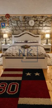 Bedroom with a double bed, nightstands, and a stone wall. - image 4