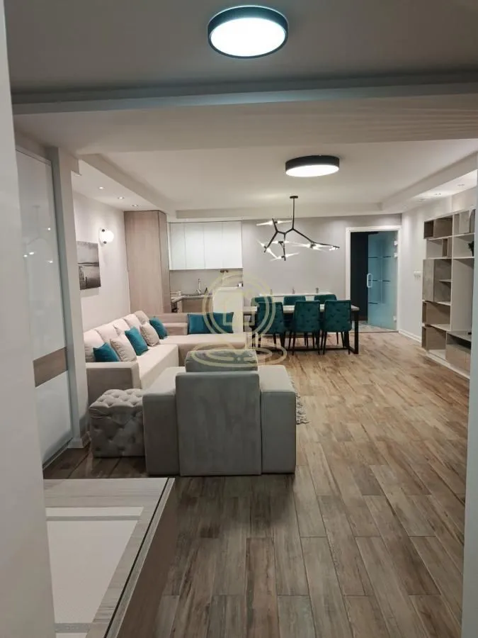 Spacious living room connected to the dining area and kitchen.